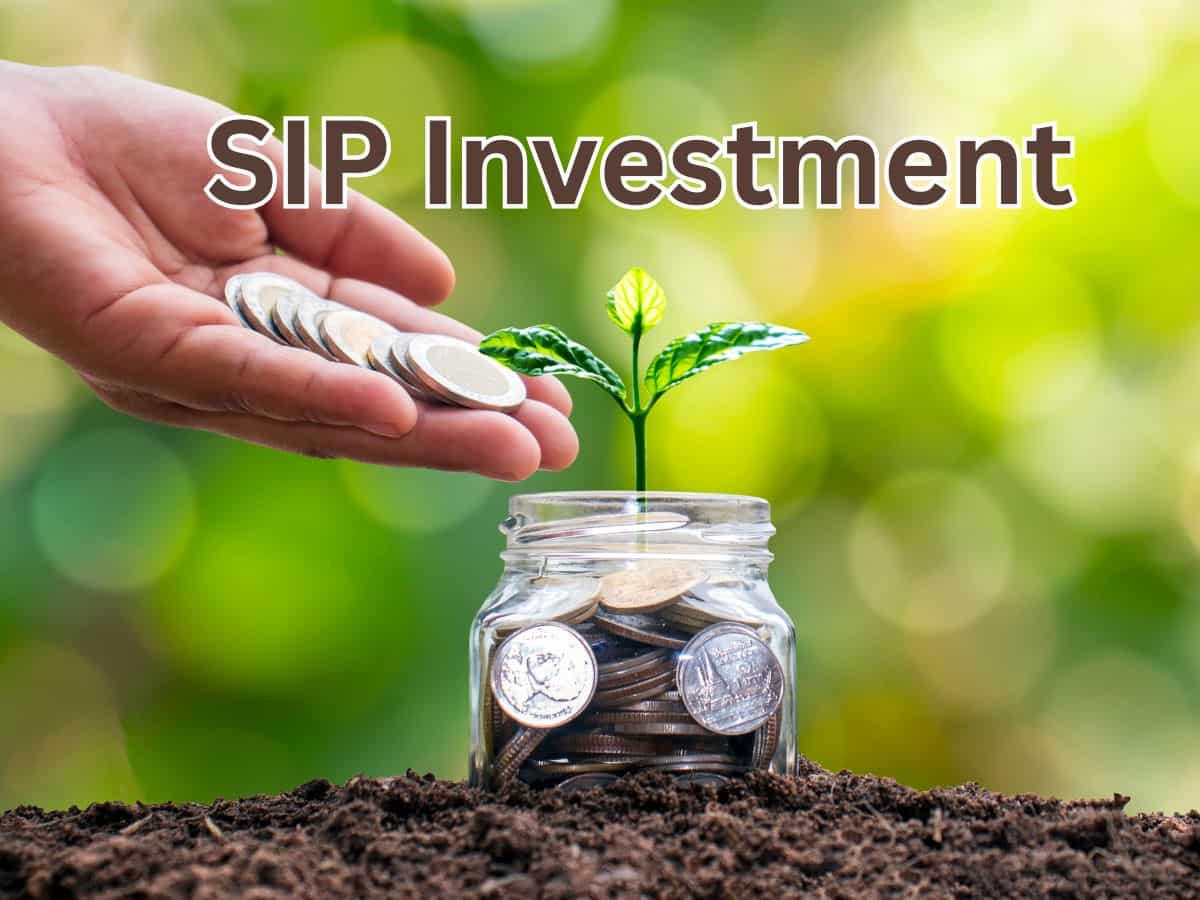 SIP investment growth concept with coins and financial chart